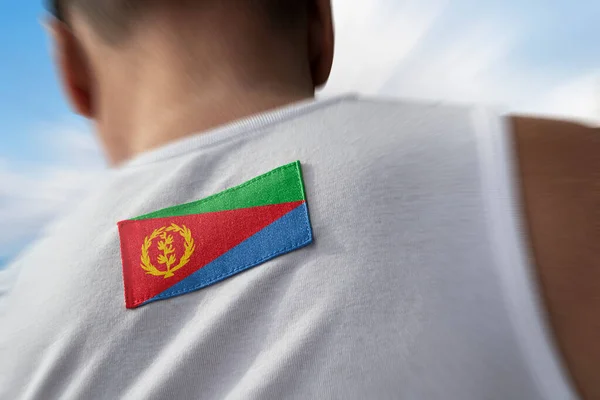 Bandeira nacional da Eritreia nas costas dos atletas — Fotografia de Stock