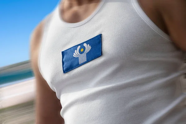 The national flag of CIS on the athletes chest — Stock Photo, Image