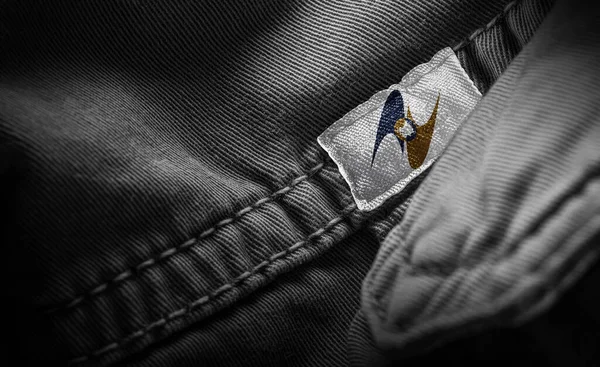Метка на темной одежде в виде флага Евразийского экономического союза — стоковое фото