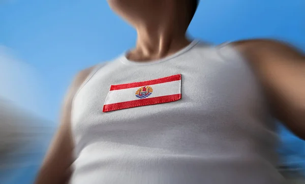 The national flag of French Polynesia on the athletes chest — Stock Photo, Image