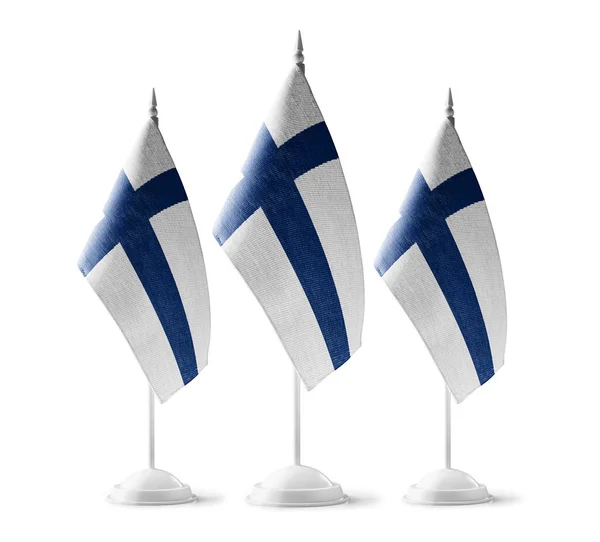 Beyaz arka planda Finlandiya 'nın küçük ulusal bayrakları — Stok fotoğraf