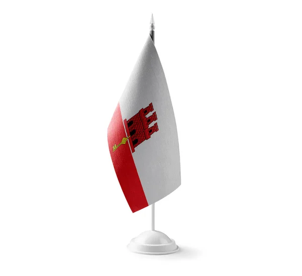 Mała flaga narodowa Gibraltaru białe tło — Zdjęcie stockowe