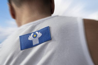 The national flag of CIS on the athletes back