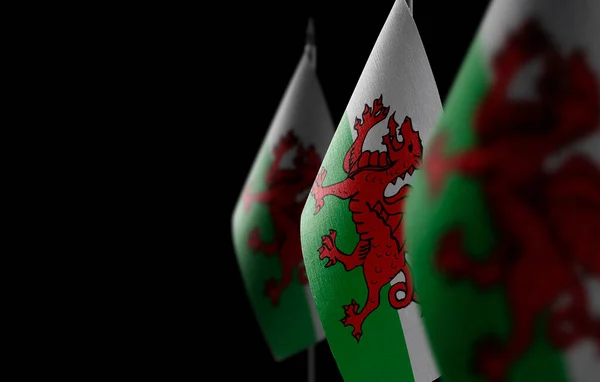 Small national flags of the Wales on a black background — Foto Stock