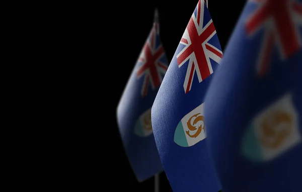 Small national flags of the Anguilla on a black background — Fotografia de Stock