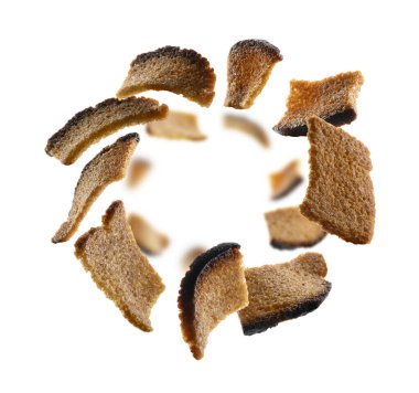Rye croutons levitate on a white background clipart