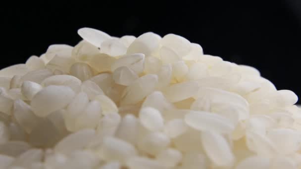 O arroz branco close-up gira em um círculo — Vídeo de Stock