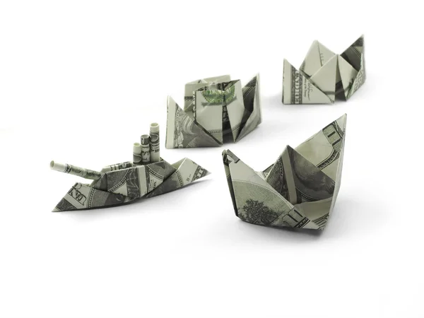 Collectie van origami schepen van honderd dollar bankbiljetten — Stockfoto