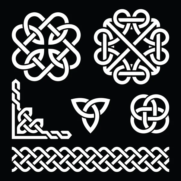 Celtic Irish knots, braids and patterns in white on black background — Stock Vector