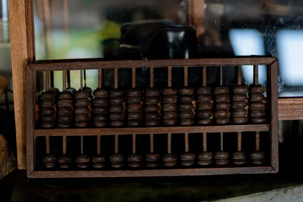 Vintage abacus. wood high quality ancient abacus. vintage abacus on rustic wooden table.