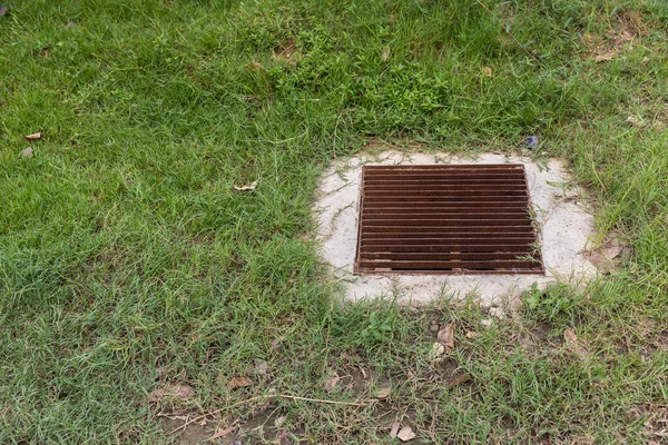 Close Grille Drain Sewer Grass Field Water Recirculation System Wastewater — Stock Photo, Image
