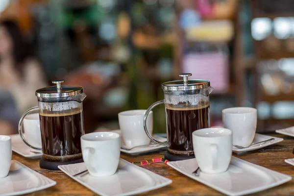 French Press Coffee Maker. Morning concept. coffee siphon. Spent coffee break at the organic cafe and prepare Chocolate or tea in French press.