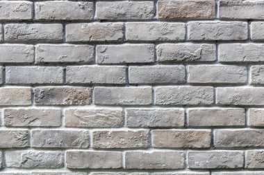 Kırsal odadaki beyaz tuğlalı arka plan. Soyut yıpranmış doku eski açık gri sıva lekesi. Beyaz grunge tuğla duvar arka planı. Arkaplan veya doku için gri tuğla duvar.