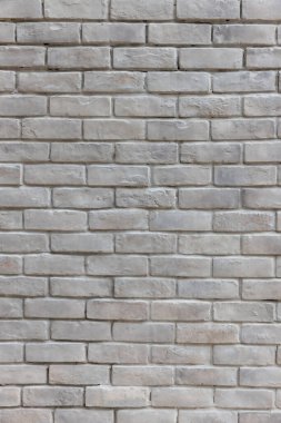 Kırsal odadaki beyaz tuğlalı arka plan. Soyut yıpranmış doku eski açık gri sıva lekesi. Beyaz grunge tuğla duvar arka planı. Arkaplan veya doku için gri tuğla duvar.