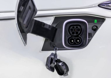 Elektrikli bir arabanın şarj portu, elektrikli arabanın şarj edilen limanı. Elektronik araba şarjı, halka açık bir şekilde kurulur. EV şarj aleti ya da elektronik araç şarj cihazı.