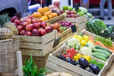 Fresh fruits at a market. Fruit stall in the city market. Fruits in baskets on market place.