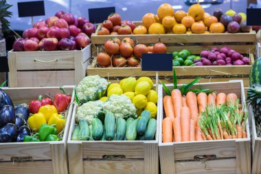 Fresh fruits at a market. Fruit stall in the city market. Fruits in baskets on market place.