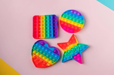 Renkli stres önleyici hareketler çocuklar için duyusal oyuncaklar. Gökkuşağı Meydanı Fidget Oyuncakları. Pop Bubble 'ı it. Popüler Rahatlatıcı kare şekilli silikon stres giderici oyuncak. 