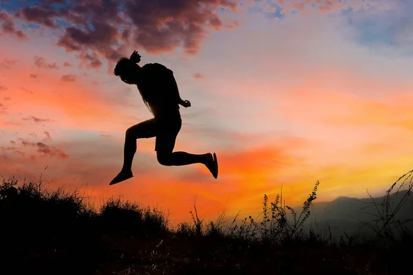 Silhouettes Men Jumping Joy Freedom Meadow Evening Time Man Jump — Stock Photo, Image