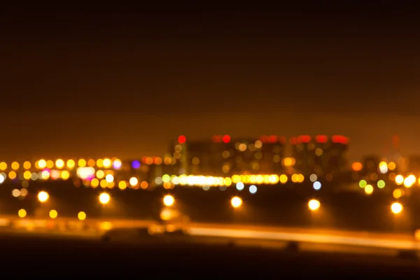 Niewyraźne zdjęcie miasta w nocy — Zdjęcie stockowe