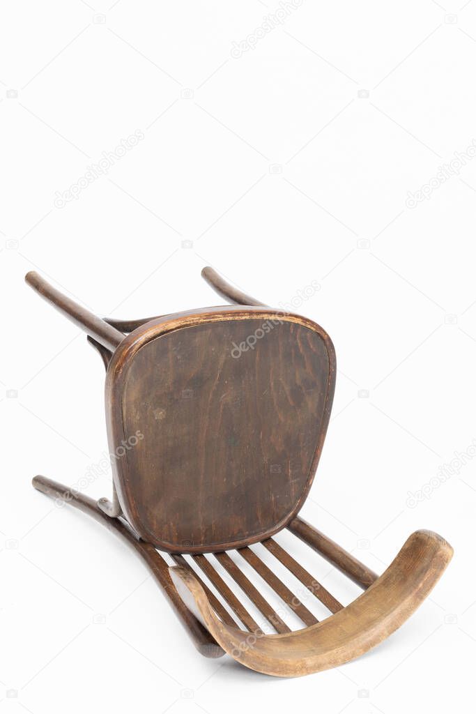 Wooden chair from turn of 70s and 80s from previous century in brown color. Polish design and production. View how it looks like