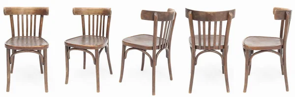 Set of wooden chairs from the turn of 70s and 80s from the previous century in dark brown color. Polish design and production. View from each side — Stock Photo, Image