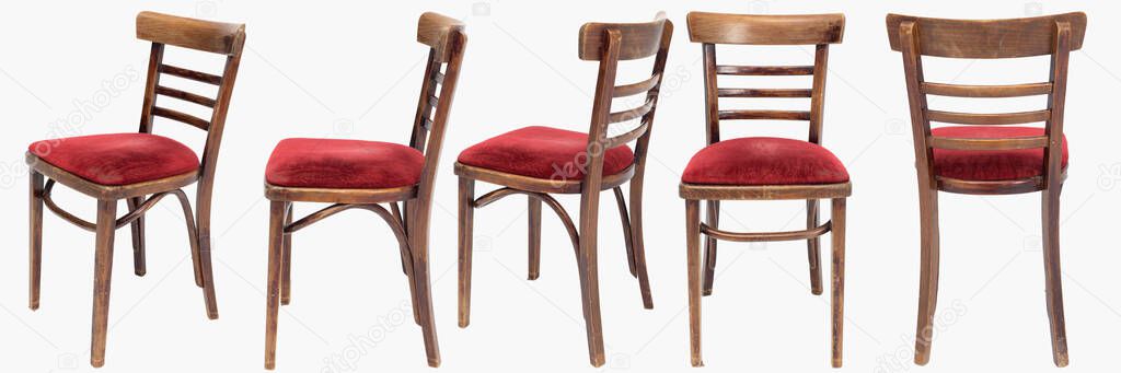 Set of wooden chairs from turn of 70s and 80s from previous century with soft red seat. Polish design and production. View from each side