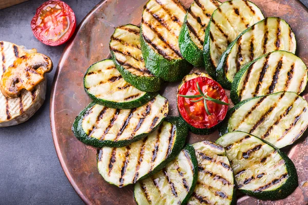 Grilled Zucchini Tomato with chili pepper.  Italian mediterranean or greek cuisine. Vegan vegetarian  food