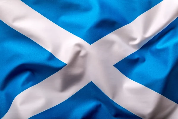 Schottland-Flagge. Schottische Stofffahne weht im Wind — Stockfoto