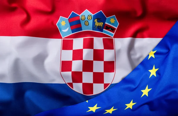 Příznaky, Chorvatsko a Evropské unie. Chorvatsko vlajka a vlajka Eu. Koncept peníze vlajky světa — Stock fotografie