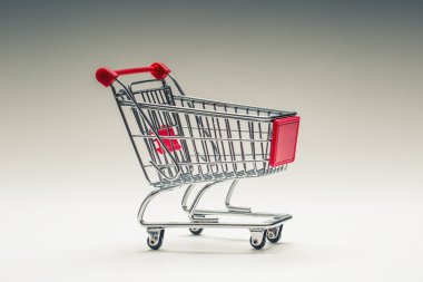 Alışveriş arabası. Alışveriş arabası. Çok collored arka plan üzerinde Alışveriş arabası. Bilgileriniz için boş alan