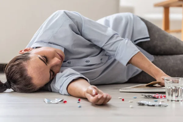 Young Woman Who Overdosed Drugs Lying Floor Fainted Holding Picture — Stock Fotó