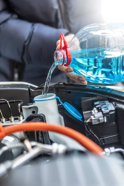 Male Driver Pours Antifreeze Tank Spray Windshield — Stock Photo, Image