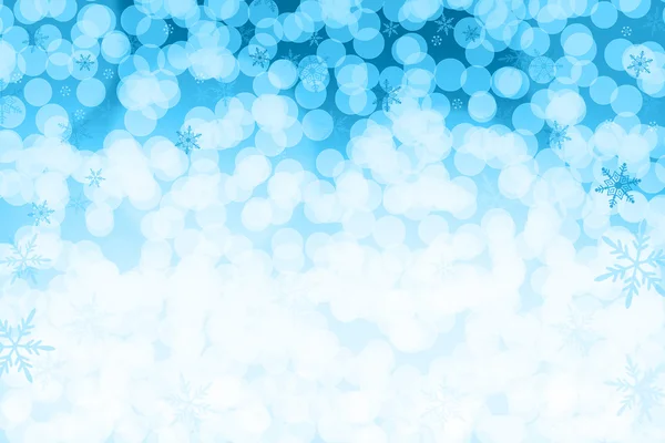 Abstract blue sparkles and snowflakes  defocused background. — Stock Photo, Image