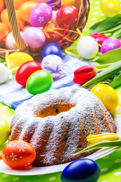 Easter cake eggs and tulips Stock Image