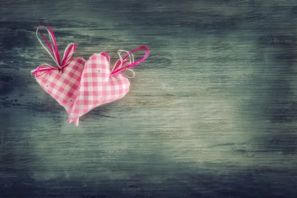 Pink hearts on wooden background. — Stock Photo, Image