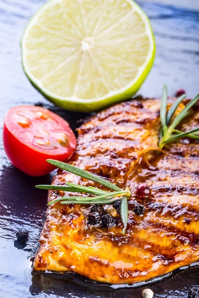 Steak chicken breast olive oil cherry tomatoes pepper and rosemary herbs. — Stock Photo, Image