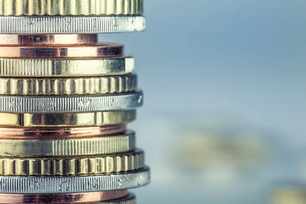 Euro coins. Euro money. Euro currency.Coins stacked on each other in different positions — Stock Photo, Image