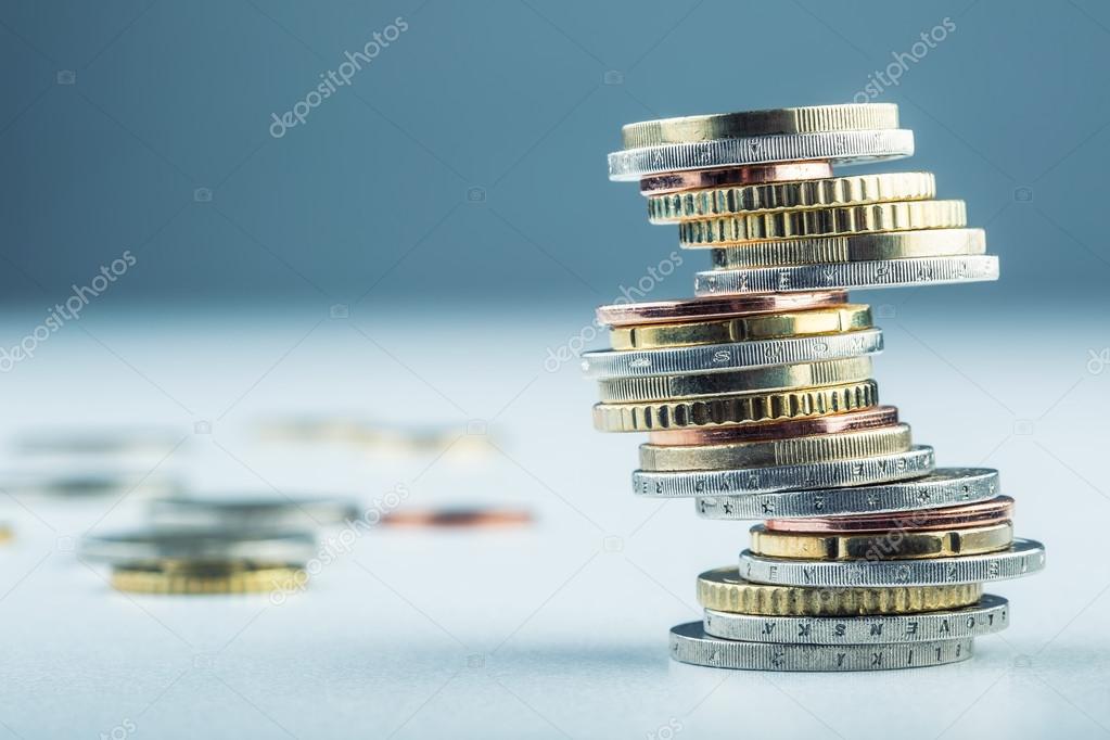 Euro coins. Euro money. Euro currency.Coins stacked on each other in different positions