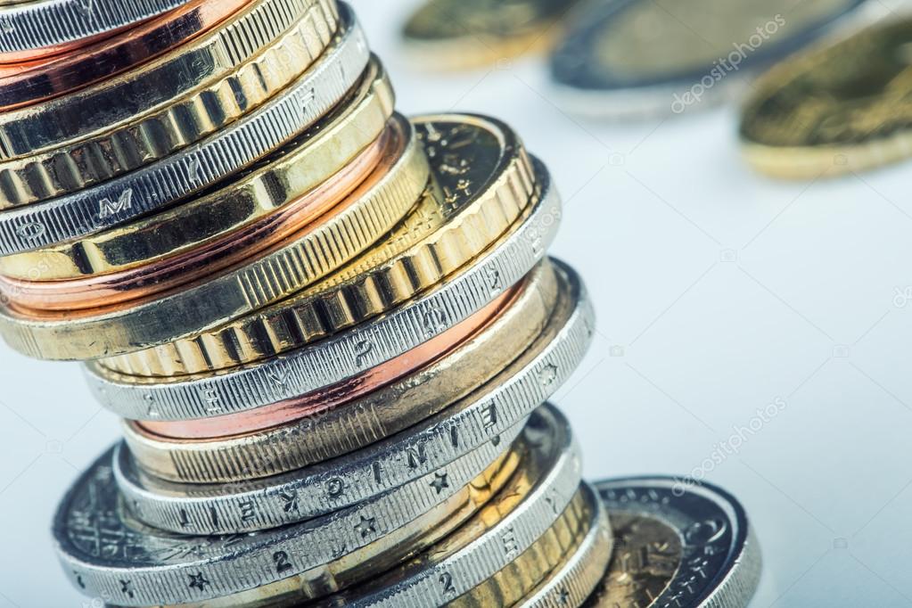 Euro coins. Euro money. Euro currency.Coins stacked on each other in different positions