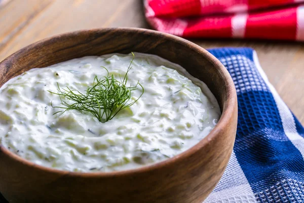Tzatziki. Greek salad tzatziki  of cucumber, yogurt or cream, olive oil, garlic, dill and spices. Herb decoration of dill. — Stock Photo, Image