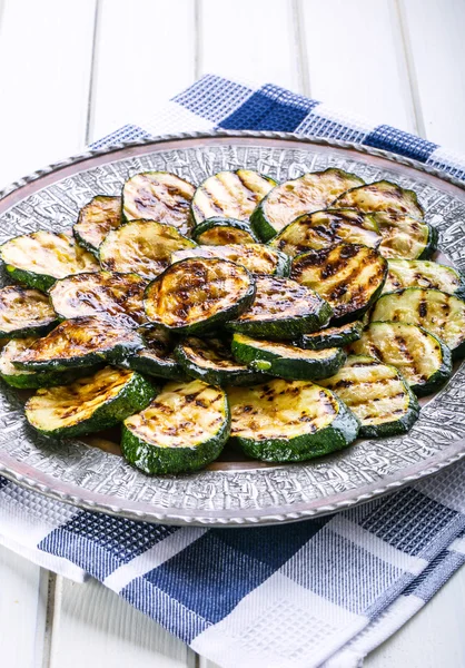 Zucchini.  Grilled zucchini. Slices of grilled zucchini on a plate. — Stock Photo, Image