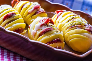 Potato.Roasts potatoes. Home cooking roasts potatoes.