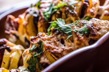 Potato.Roasts potatoes. Home cooking roasts potatoes.