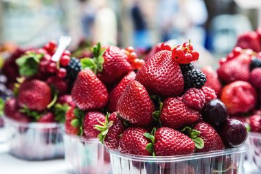 Blueberries, raspberries, strawberries, cherries Forest fruits. Gardening ,agriculture,harvest and forest concept.