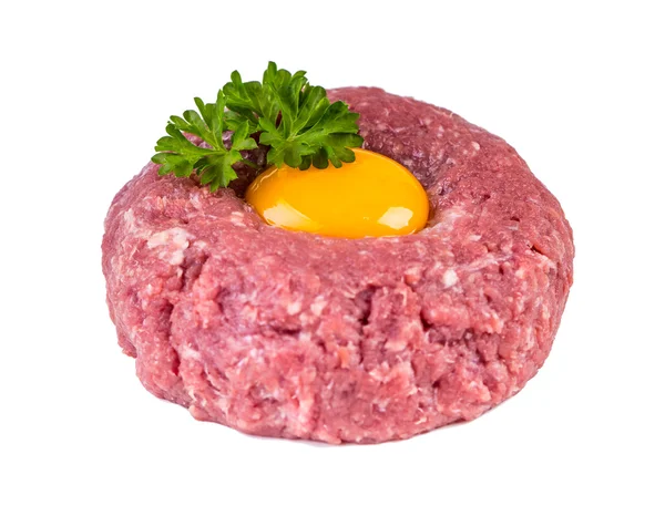 Tasty Steak tartare. Classic steak tartare over white. Ingredients: Raw beef meat salt pepper egg garlic chili herb decoration and toast bread. Isolated on white. — Stock Photo, Image