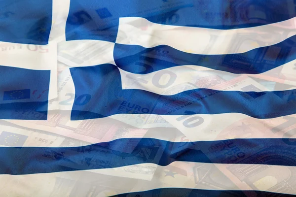 Bandera de Grecia. Dinero en euros. Moneda euro. Colorido ondeando bandera griega sobre un fondo de dinero en euros — Foto de Stock