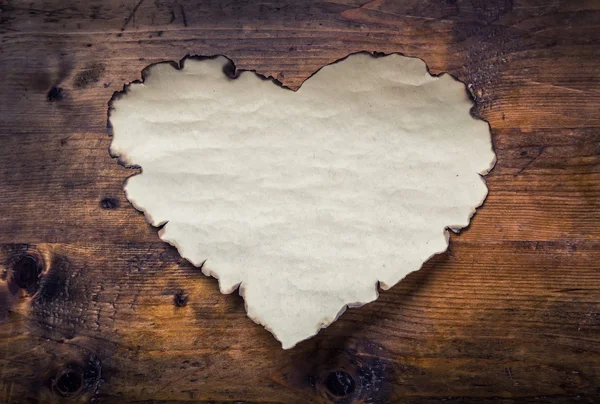 Paper hearts on a wooden board. Valentines day, Wedding day. Empty heart, free space for your love text — Stock Photo, Image