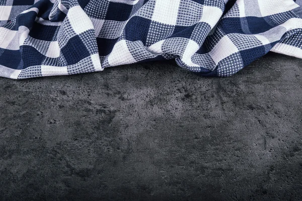 Top view of checkered kitchen tablecloth on granite -  concrete - stone background. Free space for your text or products — 스톡 사진