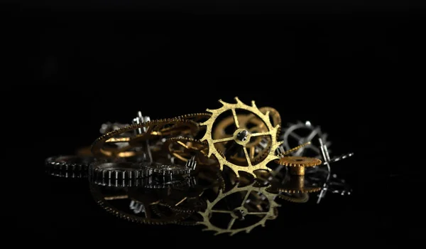 Several Gears Made Yellow Metal Black Mirror Background — Stock Photo, Image